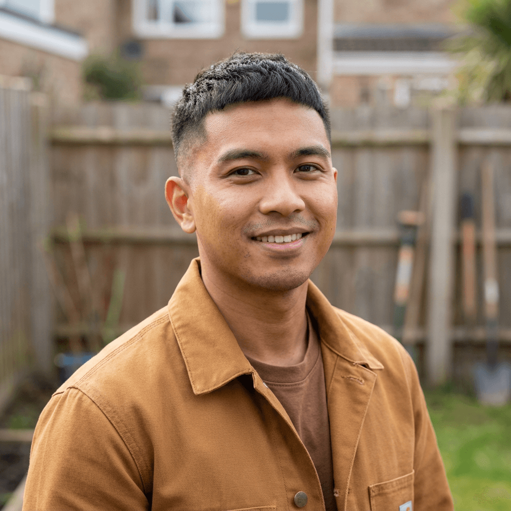 Male homeowner in his 50s, White, confident look near a clean roof